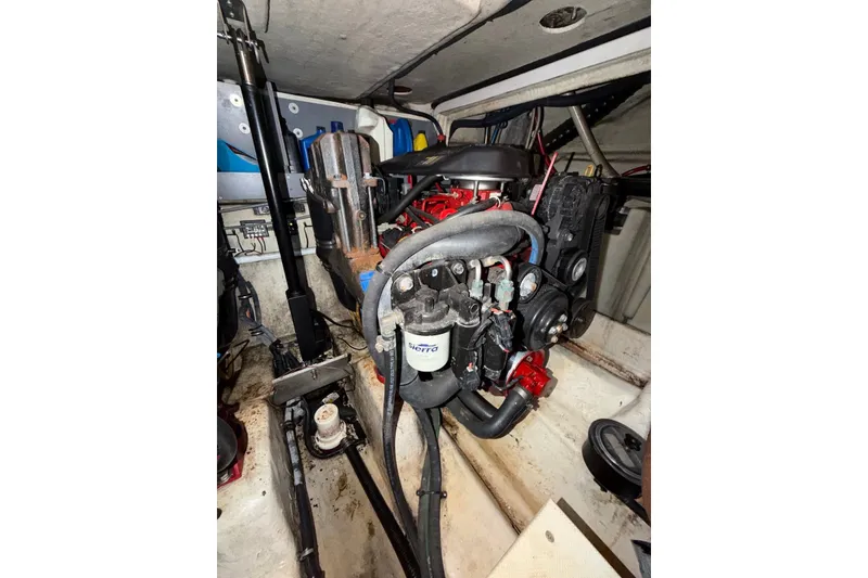 Slide: The Image of Engine compartment of a 2008 Monterey 330 Sport Yacht, showcasing mechanical components. - 41