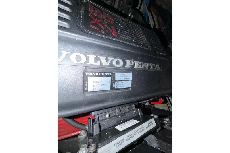 Slide: The Image of Volvo Penta engine in a 2008 Monterey 330 Sport Yacht, showcasing model details. - 44