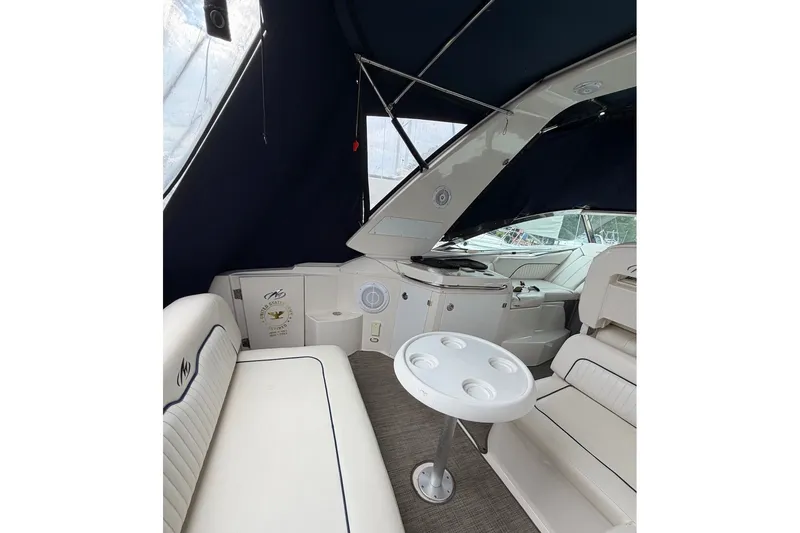 Slide: The Image of Interior of 2008 Monterey 330 Sport Yacht with seating and table. - 13