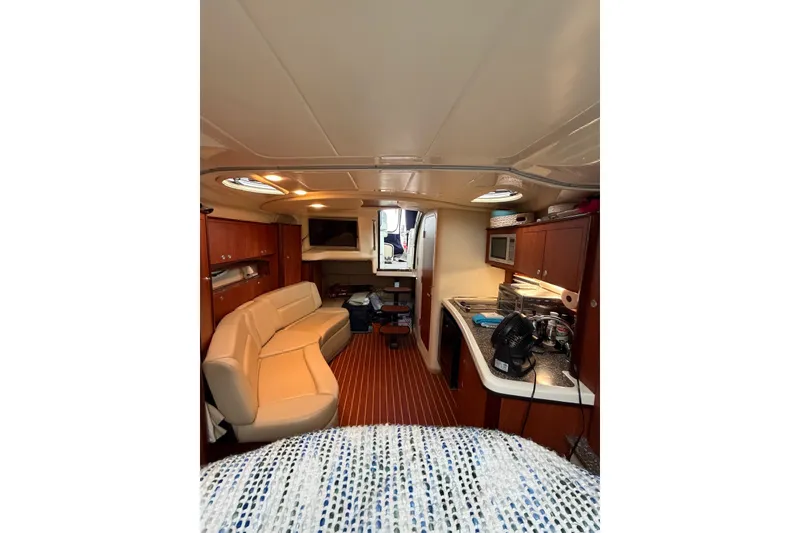 Slide: The Image of Interior of 2008 Monterey 330 Sport Yacht with cozy seating and modern amenities. - 30