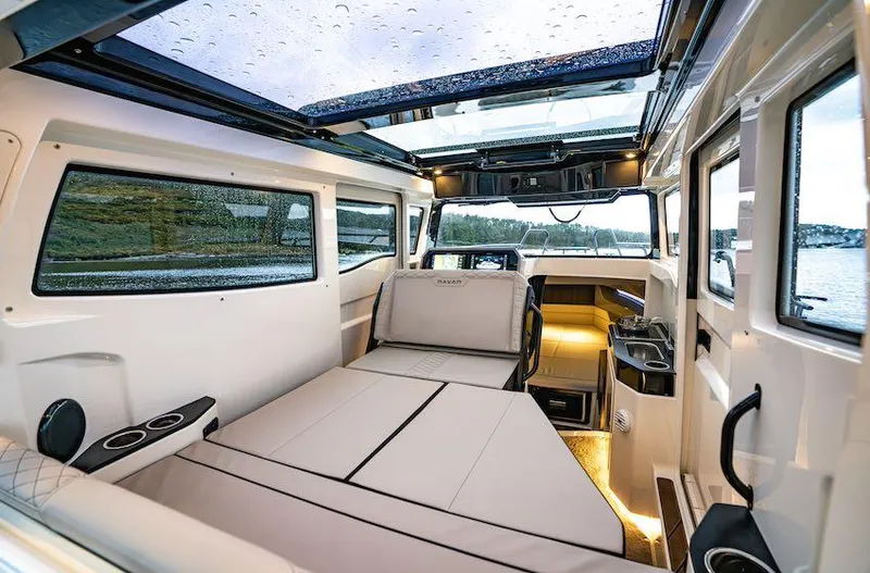 Slide: The Image of Manufacturer Provided Image: Interior of 2026 Navan C30 boat with modern seating and panoramic windows. - 19