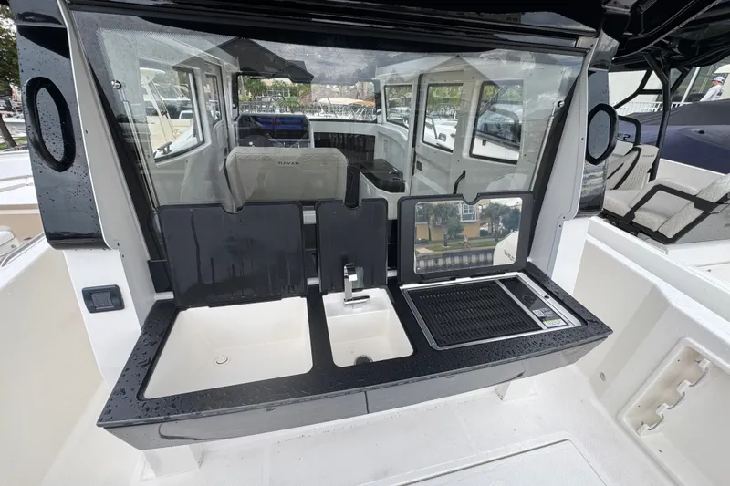 Slide: The Image of Outdoor kitchen on 2026 Navan C30 boat with sink and grill. - 28