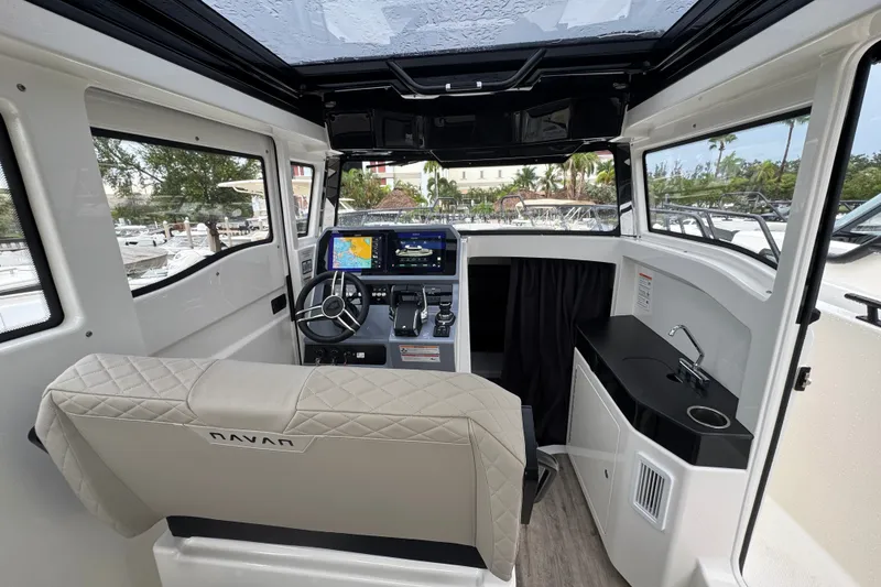 Slide: The Image of Interior of 2026 Navan C30 boat with modern dashboard and panoramic windows. - 18
