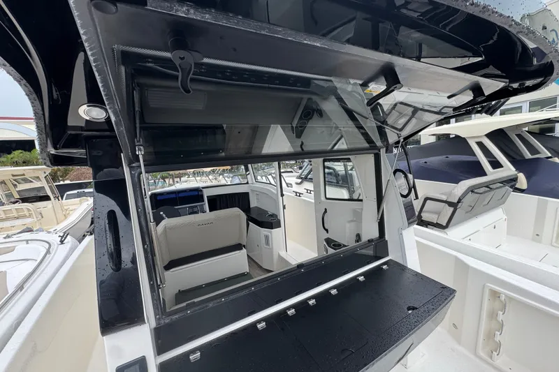 Slide: The Image of 2026 Navan C30 boat interior with open cockpit and seating area. - 29