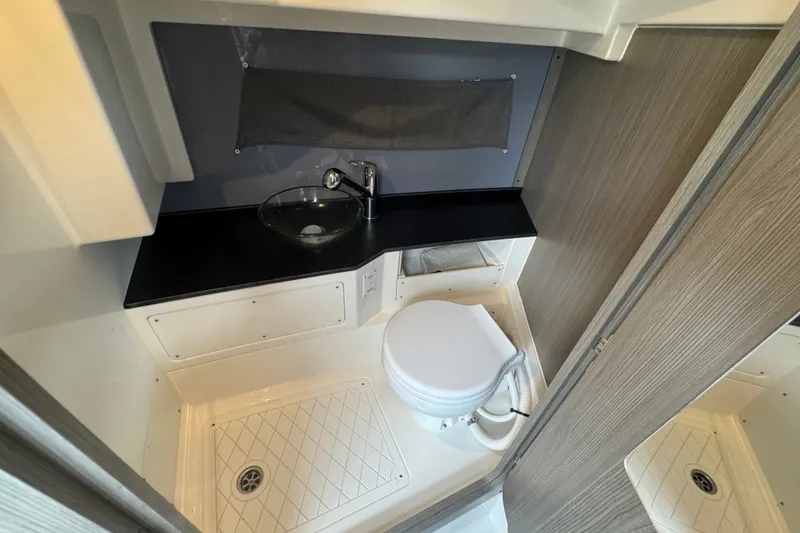 Slide: The Image of Compact bathroom in 2026 Navan C30 with modern fixtures and sleek design. - 24