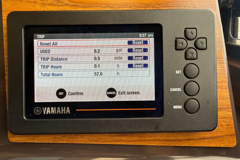 Slide: The Image of Yamaha trip monitor on 2025 Ranger Tugs R-25, displaying fuel and trip data. - 13