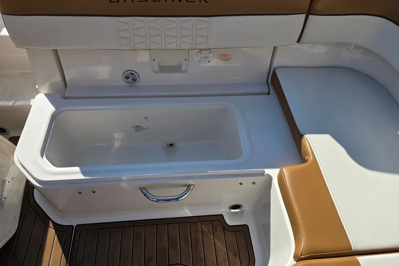 Slide: The Image of 2019 Bayliner VR6 Bowrider I/O boat interior with storage compartment and seating. - 11