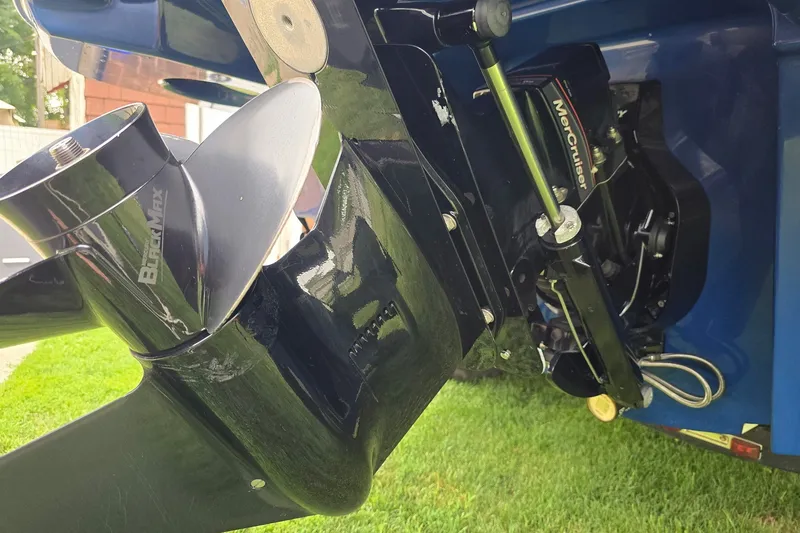 Slide: The Image of Close-up of 2019 Bayliner VR6 Bowrider I/O boat propeller and engine components. - 16