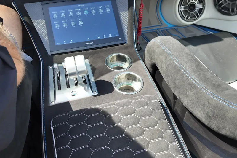 Slide: The Image of Interior of a 2027 Doug Wright 420 boat featuring a touchscreen and control panel. - 20