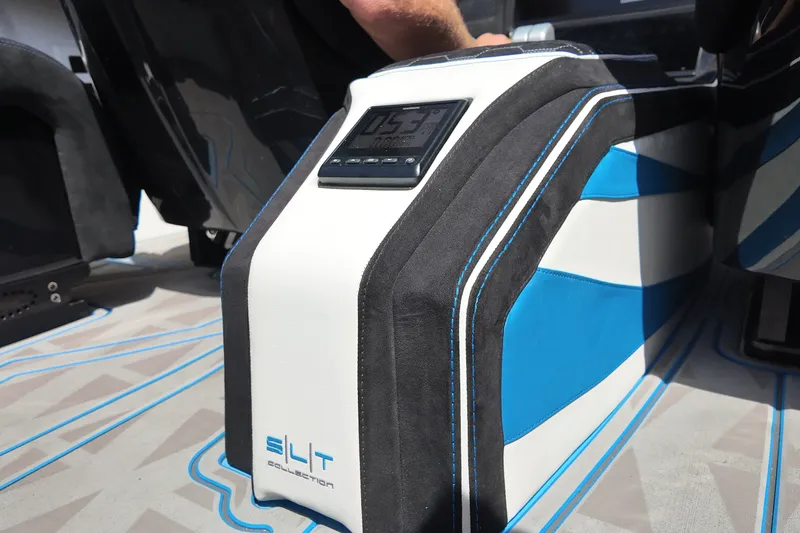 Slide: The Image of Interior of Doug Wright 420, 2027 model, featuring sleek blue and white design with digital display. - 19
