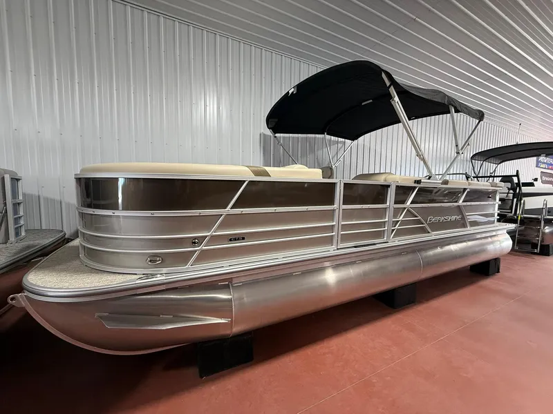 The Image of 2025 Berkshire 24CL CTS pontoon boat with canopy in showroom. - 0