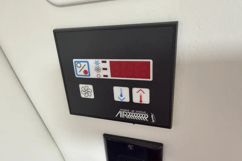 Slide: The Image of Control panel of a 2010 Crownline 280 CRX boat's marine air system. - 7