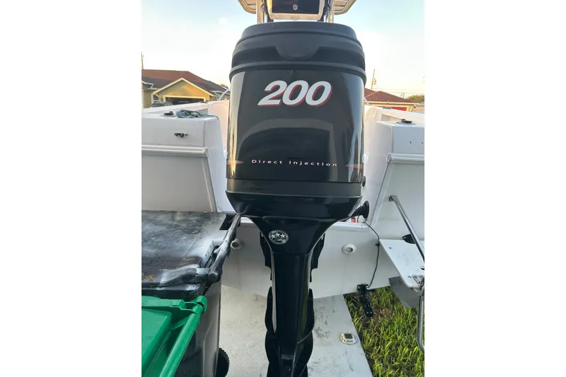 Slide: The Image of Outboard motor on a 2003 Pro-Line 22 Sport boat, featuring direct injection technology. - 21