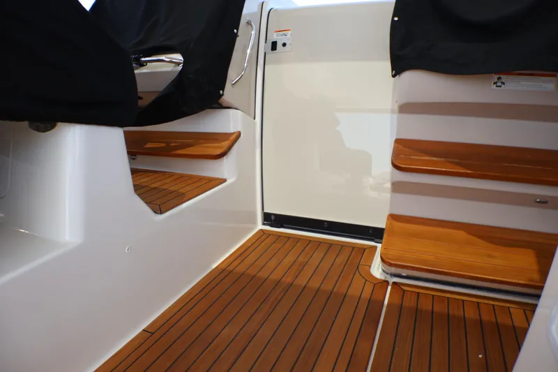 Slide: The Image of Interior view of 2021 Boston Whaler 405 Conquest with wooden steps and flooring. - 40