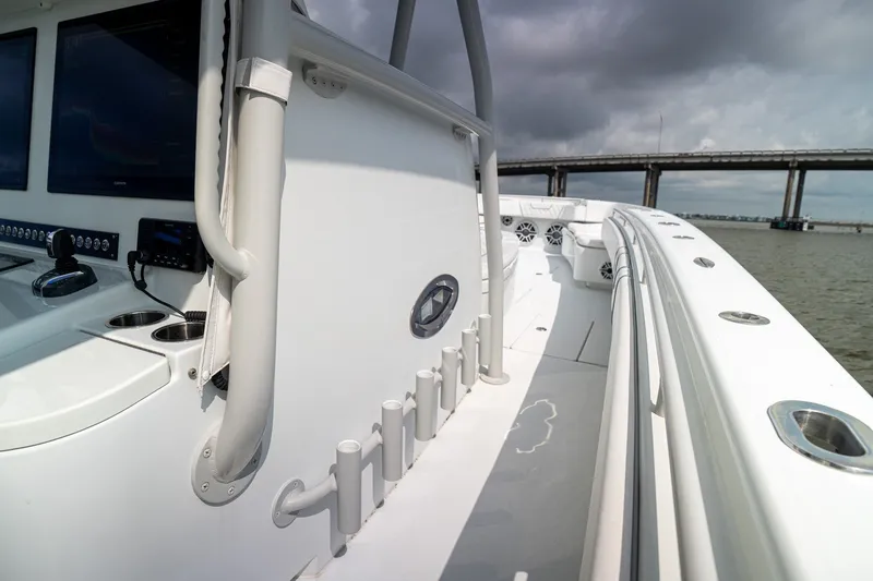 Slide: The Image of 2023 Contender 44 ST boat interior with modern controls and spacious deck. - 19