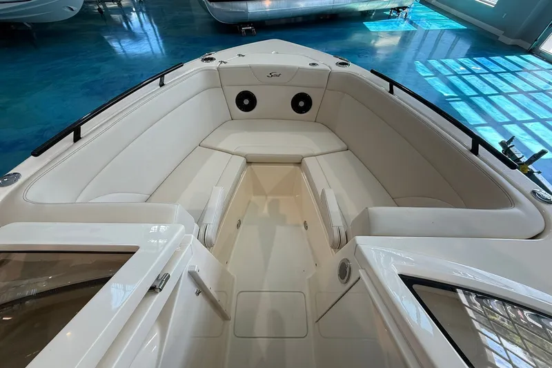 Slide: The Image of 2026 Scout 240 Dorado boat interior with spacious seating and modern design. - 5