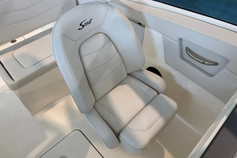 Slide: The Image of 2026 Scout 240 Dorado boat seat, featuring luxurious white upholstery and sleek design. - 11