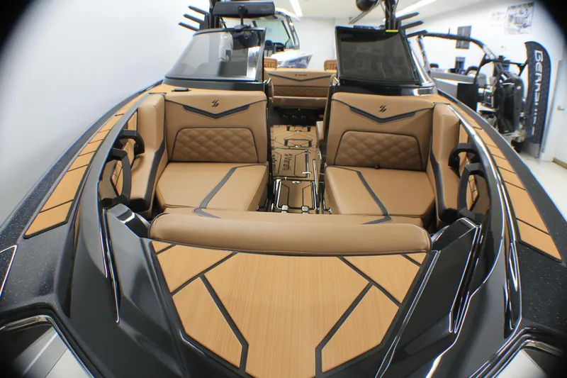 Slide: The Image of Luxurious interior of 2025 Varatti Z2373 boat with tan and black seating. - 2