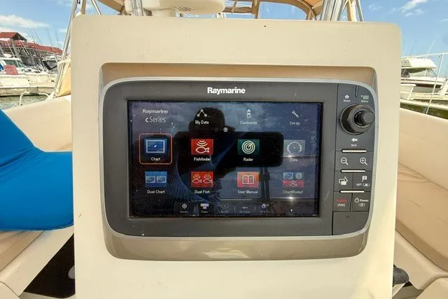 Slide: The Image of Raymarine cSeries navigation system on a 2005 Catalina 400 sailboat, docked at a marina. - 29
