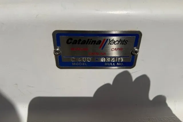 Slide: The Image of Catalina Yachts 400 model nameplate, displaying hull number, on a 2005 vessel. - 59