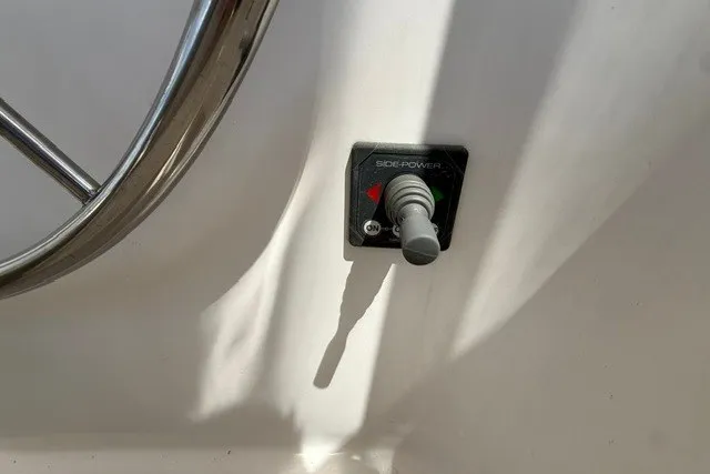 Slide: The Image of Control panel on a 2005 Catalina 400 yacht with a steering wheel. - 22