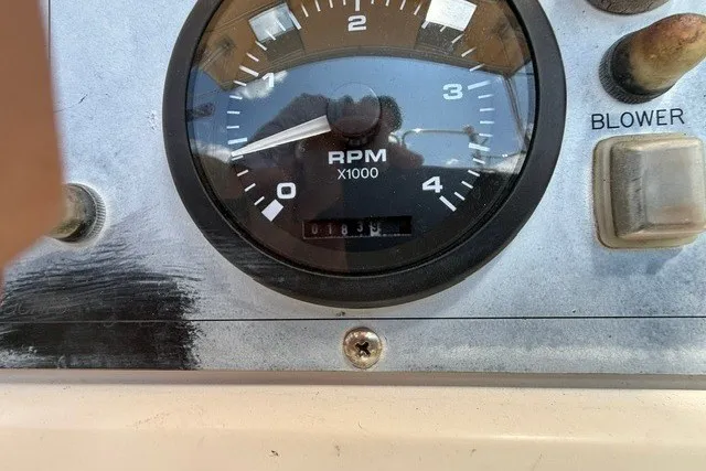 Slide: The Image of RPM gauge on a 2005 Catalina 400 boat dashboard, showing 1.8 x 1000 RPM. - 28