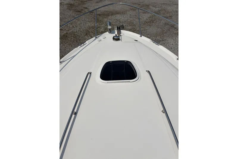 Slide: The Image of Bow view of 2005 Sea Ray 340 Sundancer with open hatch and railings. - 6