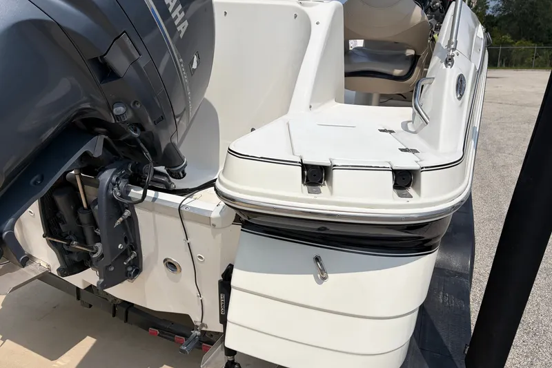 Slide: The Image of 2012 Hurricane SunDeck Sport 220 OB boat with Yamaha outboard motor, rear view. - 15