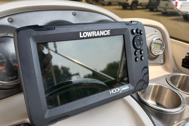Slide: The Image of Lowrance Hook Reveal GPS on 2012 Hurricane SunDeck Sport 220 OB dashboard. - 36