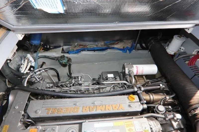 Slide: The Image of Engine compartment of 2004 Mainship 390 Trawler with Yanmar diesel engine. - 22