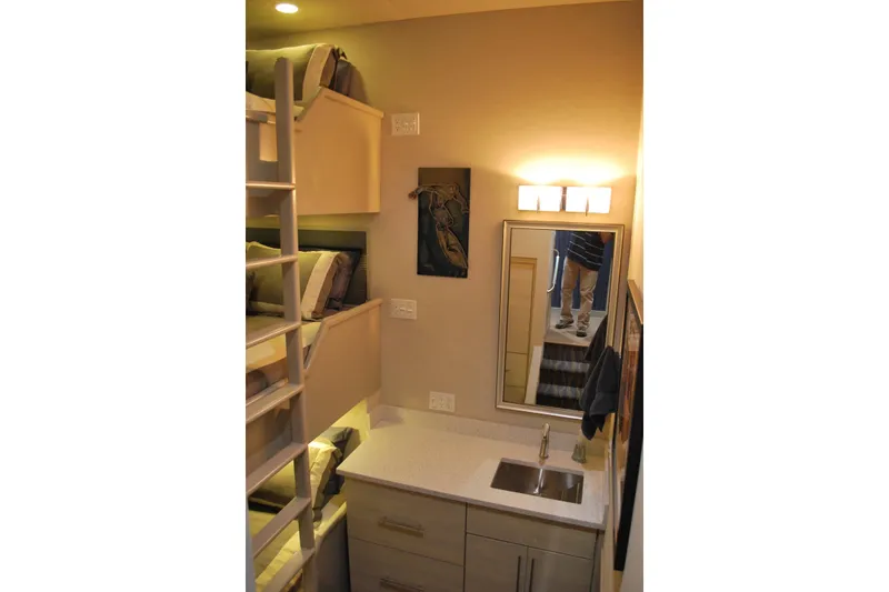Slide: The Image of Compact cabin interior with bunk beds, sink, and mirror on Adonia Azul Trip #1, 2017. - 16