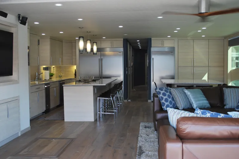 Slide: The Image of Modern kitchen and living area in Adonia Azul Trip, 2017, featuring sleek design and cozy seating. - 3