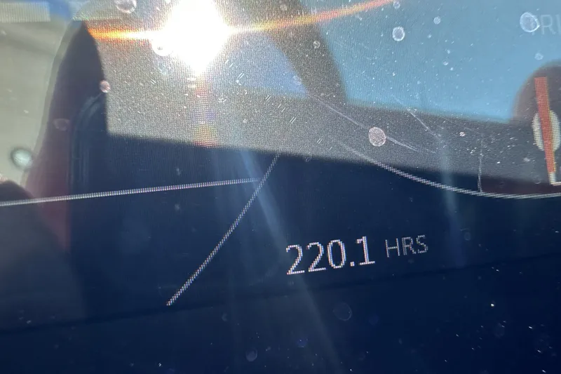 Slide: The Image of Display screen showing 220.1 hours on a 2018 Sea Ray SLX 310 Outboard. - 22