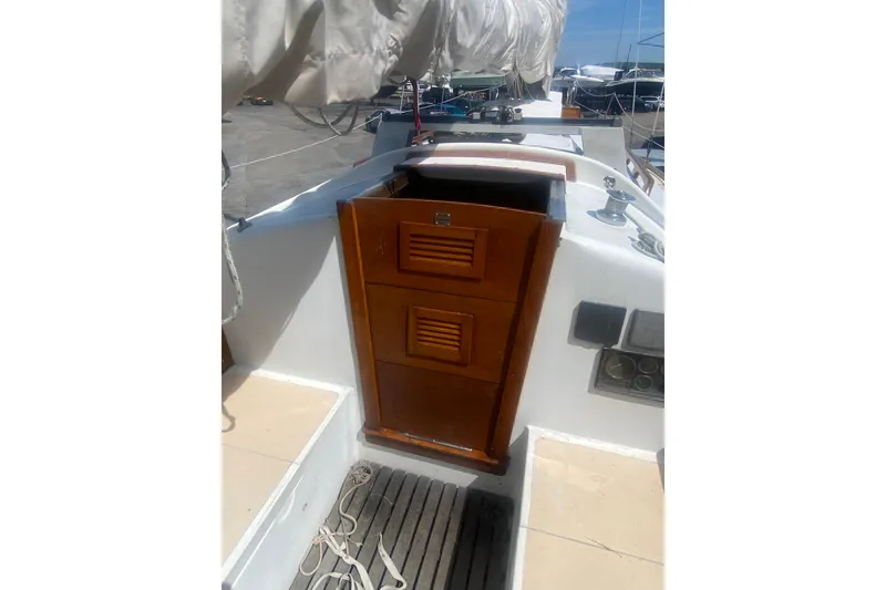 Slide: The Image of 1982 Bristol 40 sailboat cockpit with wooden hatch and rigging. - 10