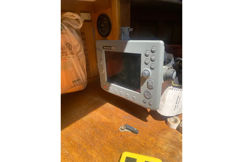 Slide: The Image of Raymarine navigation device inside a 1982 Bristol 40 boat cabin. - 3