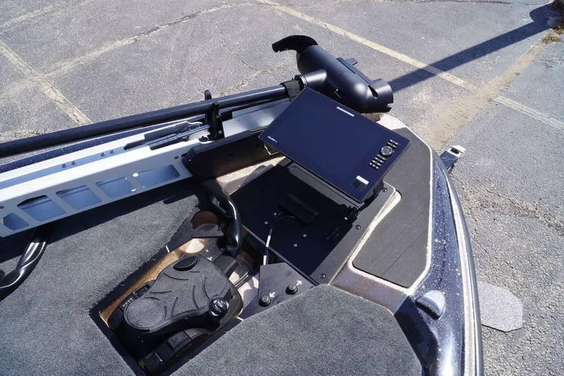Slide: The Image of 2027 Skeeter FXE21 Limited boat deck with advanced navigation system and foot pedal controls. - 24
