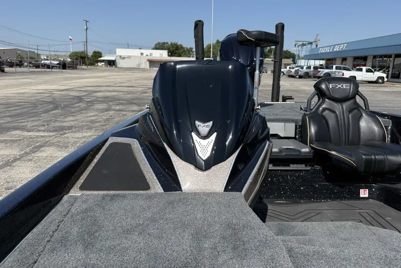 Slide: The Image of 2027 Skeeter FXE21 Limited boat with sleek design and comfortable seating. - 30