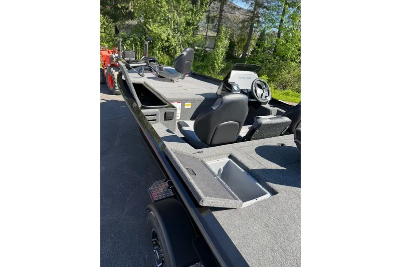 Slide: The Image of 2026 Crestliner XFC 179 fishing boat interior with seating and storage compartments. - 9