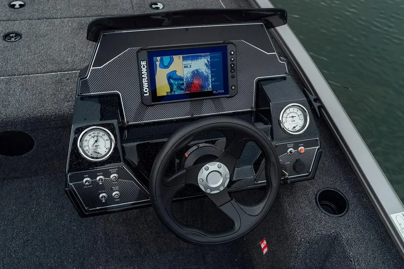 Slide: The Image of Manufacturer Provided Image: 2026 Crestliner XFC 179 boat dashboard with Lowrance Elite fishfinder and steering wheel. - 15