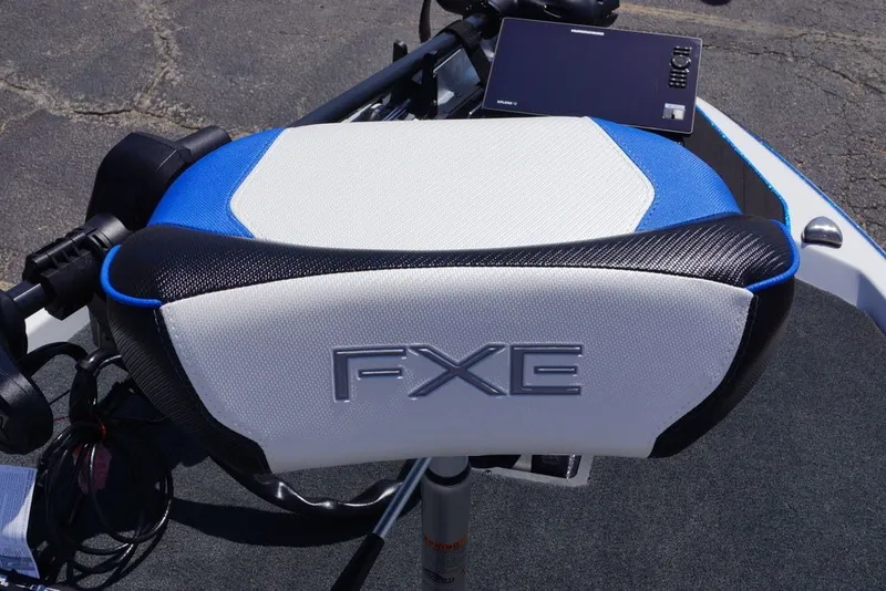 Slide: The Image of Skeeter FXE20 Limited 2027 boat seat with blue and black accents. - 30