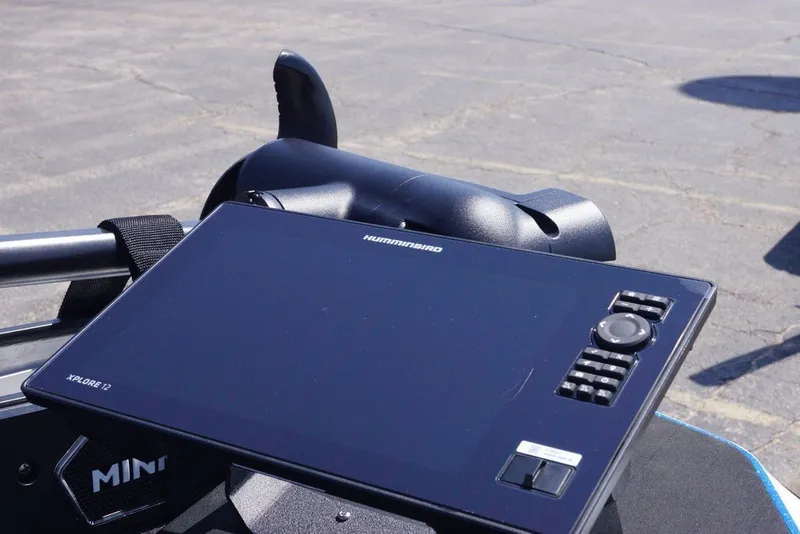 Slide: The Image of 2027 Skeeter FXE20 Limited with Humminbird Xplore 12 fish finder on deck. - 24