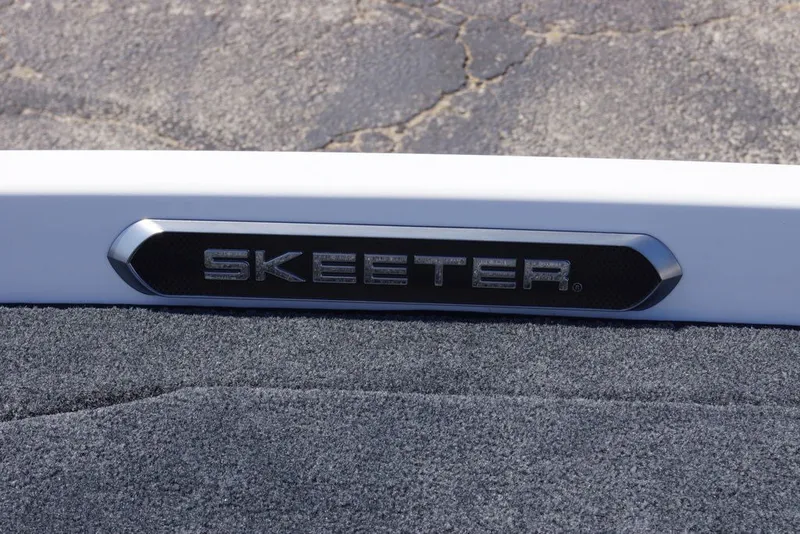 Slide: The Image of 2027 Skeeter FXE20 Limited logo on textured surface. - 25