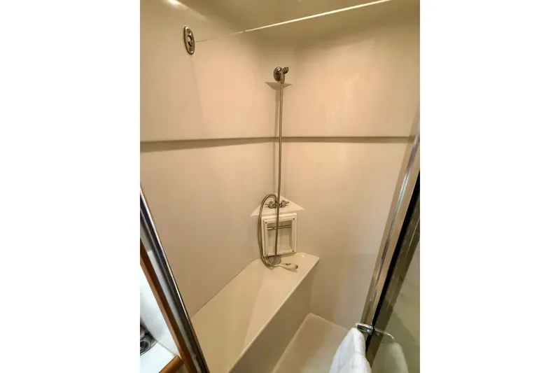 Slide: The Image of Shower area in 1994 Carver 440 Aft Cabin Motor Yacht, featuring sleek design and modern fixtures. - 28