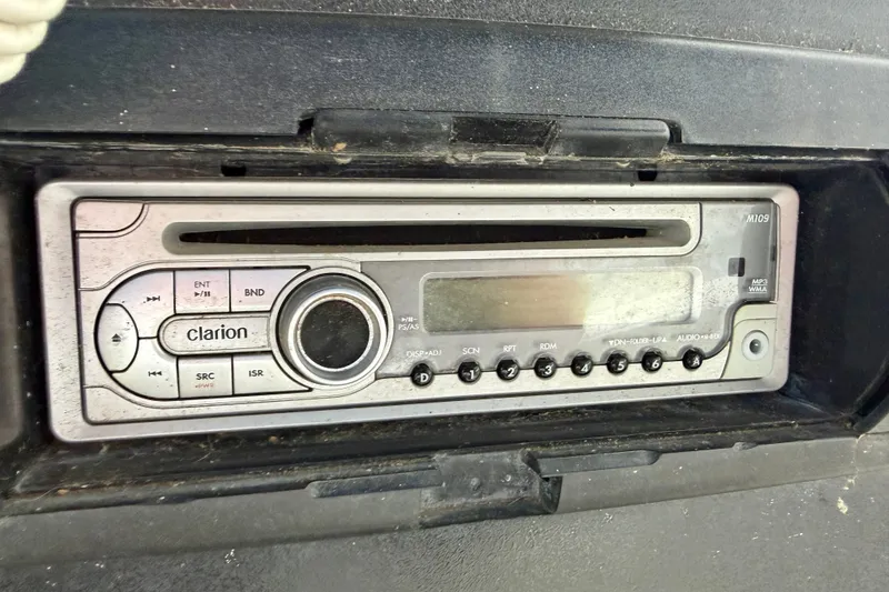 Slide: The Image of Clarion stereo system in a 1994 Carver 440 Aft Cabin Motor Yacht dashboard. - 12