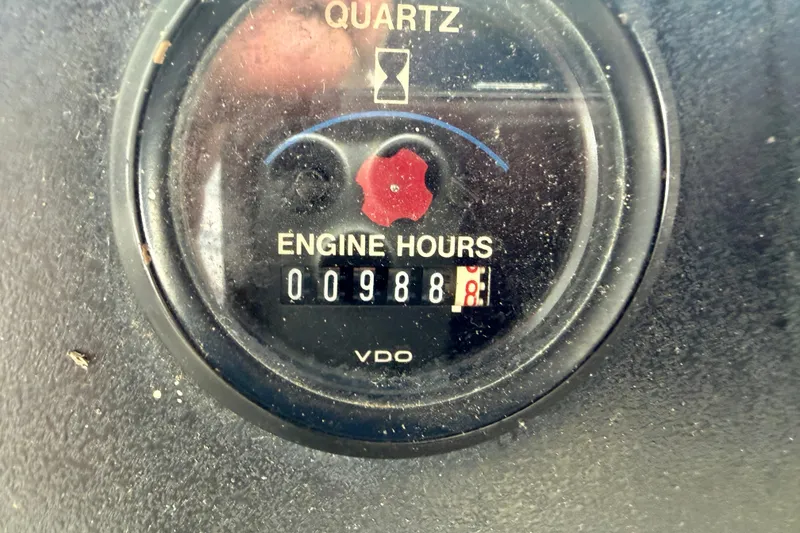 Slide: The Image of Engine hour meter showing 988 hours on 1994 Carver 440 Aft Cabin Motor Yacht. - 11