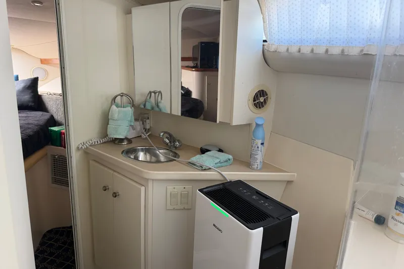 Slide: The Image of Bathroom interior of 2001 Carver 380 Santego SE yacht with sink and air purifier. - 10