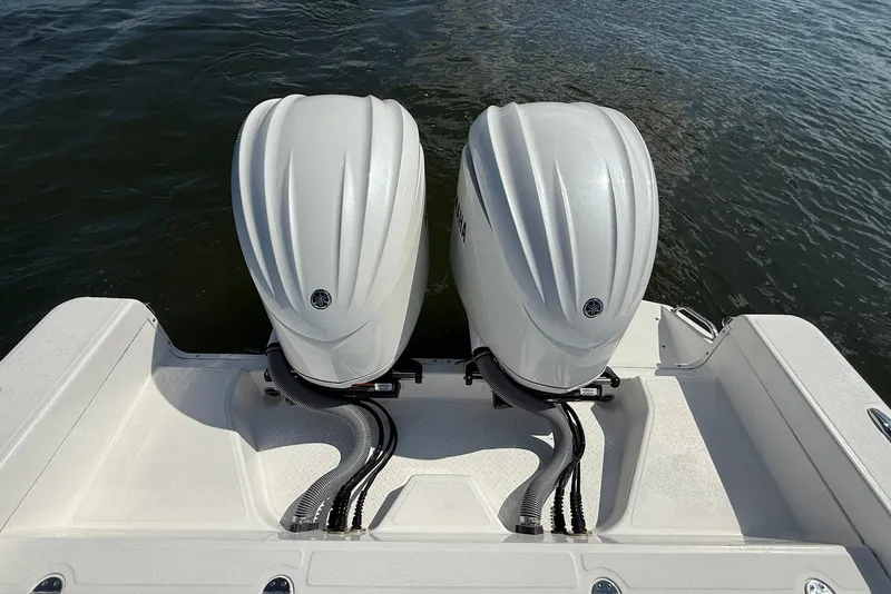 Slide: The Image of Twin outboard engines on a 2022 Everglades 273 Center Console boat. - 8