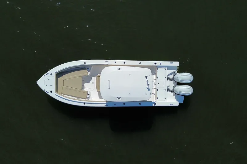 Slide: The Image of Overhead view of 2022 Everglades 273 Center Console boat on water. - 7