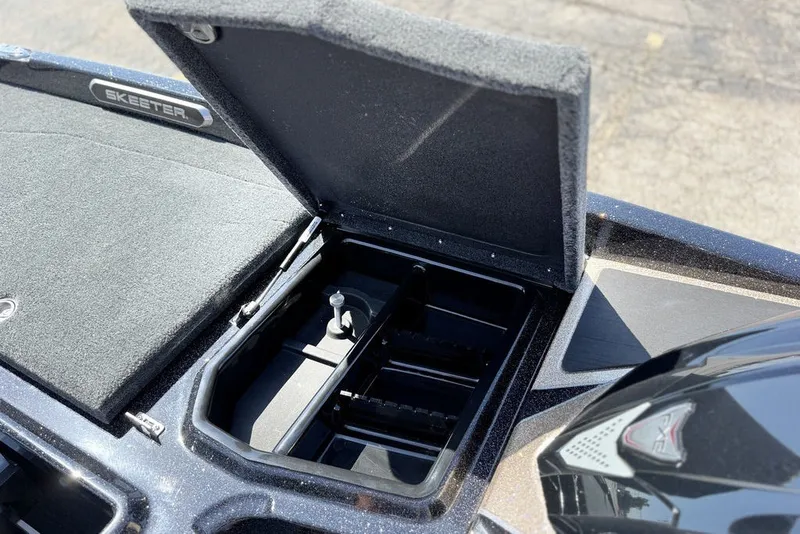 Slide: The Image of Open storage compartment on 2027 Skeeter FXE20 Limited boat deck. - 15