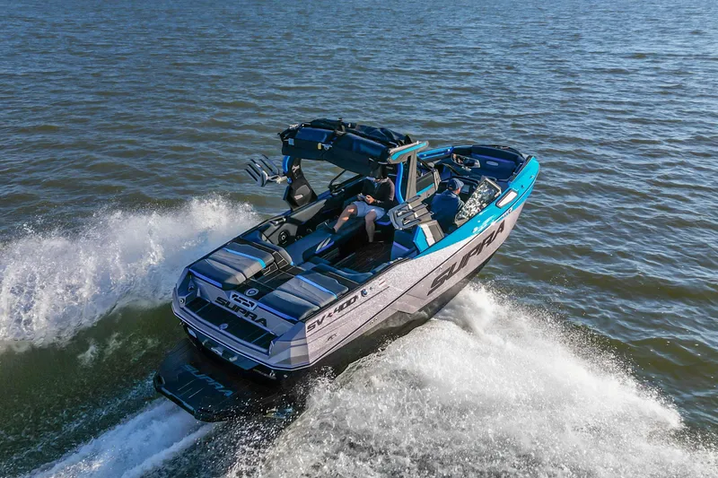 The Image of 2024 Supra SV 400 boat cruising on open water, showcasing sleek design and performance. - 4